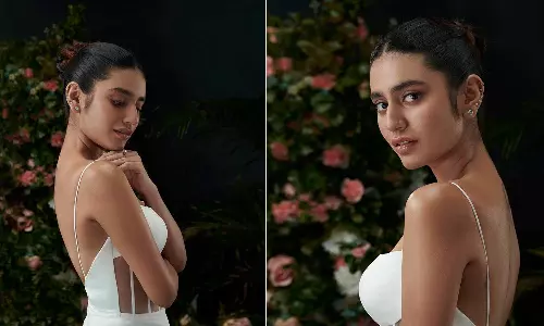 ஸ்வீட் ஏஞ்சல் வெள்ளை நிற கவர்ச்சி உடையில் பிரியா வாரியர்