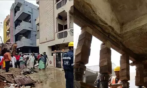 வீடுகளுக்குள் 16 பேர் இருக்கும்போதே 3 மாடி கட்டிடத்தை நவீன எந்திரம் மூலம் தூக்கிய உரிமையாளர்