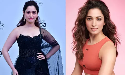 காலில் விழுந்த ரசிகர்.. கண்கலங்கி கட்டியணைத்த தமன்னா