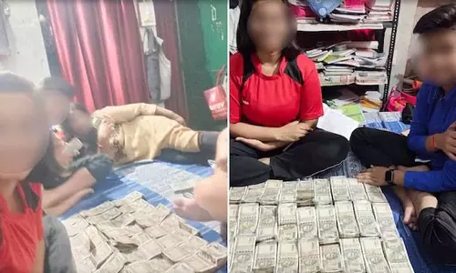 மனைவி, குழந்தைகளோடு 500 ரூபாய் நோட்டுகளுடன் செல்பி எடுத்து சிக்கலில் மாட்டிக்கொண்ட போலீஸ் அதிகாரி