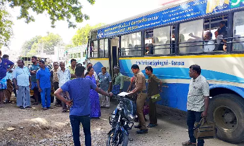அரசு பஸ் டிரைவருடன் வாக்குவாதம் செய்த பெண்