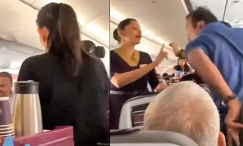 நடுவானில் பயணிகளுக்கு இடையே வாக்குவாதம்