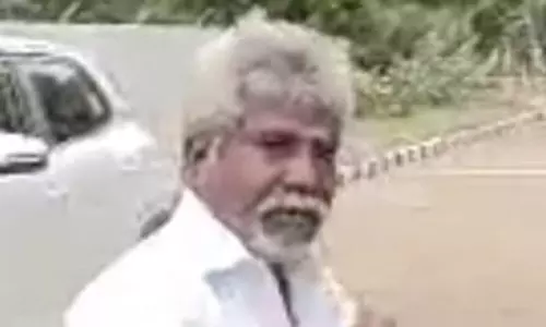 பர்சை திருடிய முதியவர்