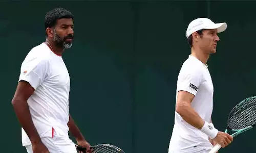 விம்பிள்டன் டென்னிஸ்: இரட்டையர் பிரிவில் காலிறுதிக்கு முன்னேறிய போபண்ணா ஜோடி