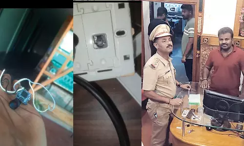 ஓட்டலில் இளம் ஜோடி தங்கியிருந்த அறையில் ரகசிய கேமரா- படுக்கைக்கு எதிரே  வைத்திருந்தது கண்டுபிடிப்பு