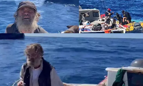 உணவாக மீன், குடிநீராக மழைநீர்: தனது நாயுடன் 2 மாதங்களாக நடுக்கடலில் தத்தளித்தவர் உயிர்பிழைத்த அதிசயம்