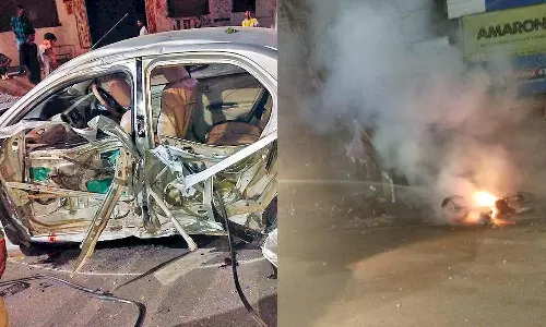 புதுச்சேரியில் அதிவேகமாக சென்று பைக்குகள், மின் கம்பம் மீது மோதியது- கார் நடுரோட்டில் தீப்பிடித்து எரிந்து வாலிபர் பலி