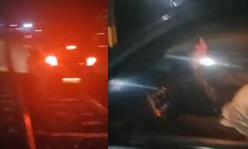 குடிபோதையில் ரோடு என நினைத்து தண்டவாளத்தில் காரை ஓட்டிய குடிமகன்...!