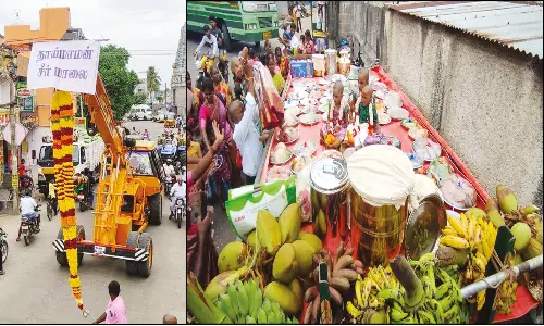 காதணி விழாவுக்காக கிரேன் மூலம் 15 அடி உயர மாலை எடுத்து சென்ற தாய்மாமன்