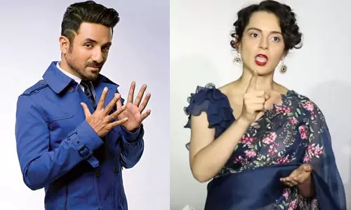 வீர்தாஸ் உதட்டை கடித்தேனா..? கங்கனா அதிரடி பதில்