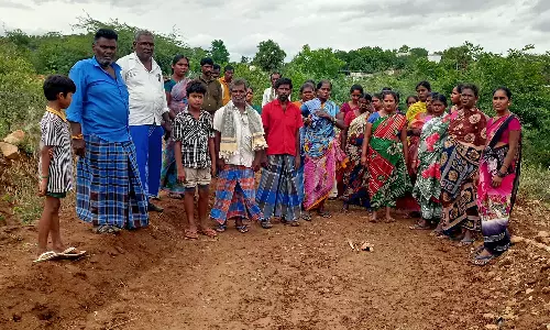 ஏரியூர் அருகே மயானத்தில் சாலை அமைத்ததால் பொதுமக்கள் போராட்டம்- தோண்டி எடுத்து எலும்புக்கூடுகள் வீசப்பட்டன