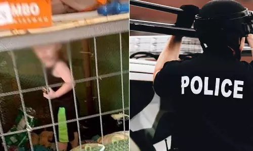 நாய் கூண்டில் அடைத்து 6 குழந்தைகள் சித்ரவதை: பெற்றோரை கைது செய்த அமெரிக்க காவல்துறை