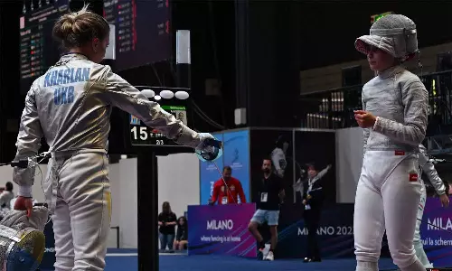 ரஷிய வீராங்கனையுடன் கைகுலுக்க மறுத்ததால் தகுதி நீக்கம் செய்யப்பட்ட உக்ரைன் வீராங்கனை