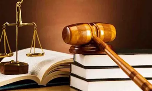 பெண்ணை தாக்கிய வாலிபர் மீது வழக்கு