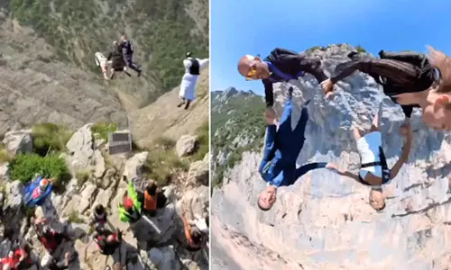 விருந்தினர்களுடன் சேர்ந்து ஸ்கை டைவிங் செய்து திருமணத்தை கொண்டாடிய புதுமணத்தம்பதி