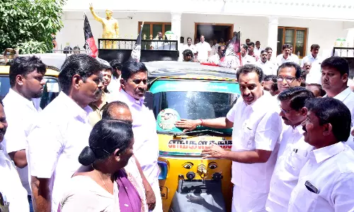 அ.தி.மு.க. மாநாடு பிரச்சார ஸ்டிக்கர் ஒட்டும் பணி