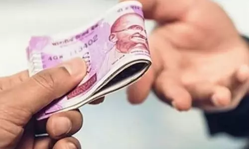 அரசு போக்குவரத்து பணிமனையில் பணி ஒதுக்கீடு செய்ய லஞ்சம் கேட்ட அதிகாரி சஸ்பெண்டு