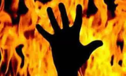 சமையல் தொழிலாளி தீயில் கருகி சாவு