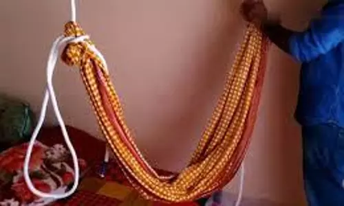 குழந்தையின் தொட்டில் கயிறு இறுக்கி வாலிபர் சாவு