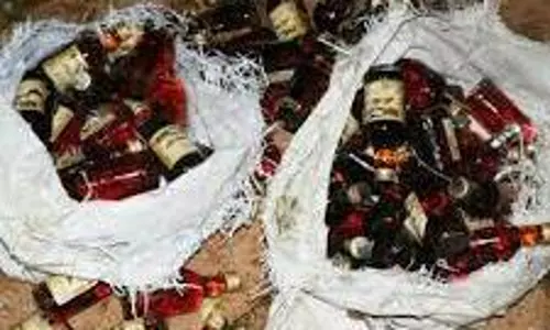 மது விற்ற பெண் உள்ளிட்ட இருவர் கைது