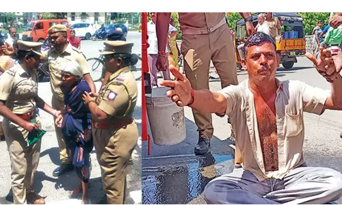 சேலம் கலெக்டர் அலுவலகம் முன்பு இன்று மூதாட்டி உள்பட 2 பேர் தீக்குளிக்க முயற்சி