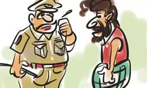 போலீஸ்காரருக்கு கொலை மிரட்டல்