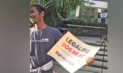 நாய் இறைச்சிக்கு ஆதரவாக கையெழுத்து இயக்கம் நடத்திய வாலிபர்