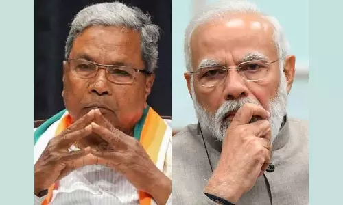 மோடியை வரவேற்க சித்தராமையாவுக்கு தடை: காங்கிரஸ் கடும் கண்டனம்