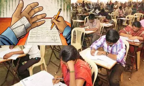 சப்-இன்ஸ்பெக்டர் தேர்வில் காப்பி அடித்த போலீஸ்காரர் மனைவி சிக்கினார்