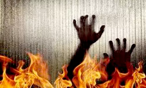 தொழிலாளி தீயில் கருகி சாவு