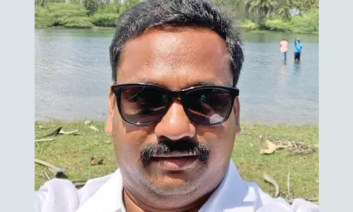 புதுச்சேரி காமாட்சியம்மன் கோவில் ரூ.50 கோடி நில மோசடி வழக்கில் அதிகாரி கைது