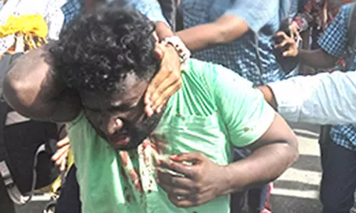 மதுரை பெரியார் பஸ் நிலையத்தில் பயணிகளிடம் செல்போன் பறித்த வடமாநில வாலிபருக்கு தர்ம அடி