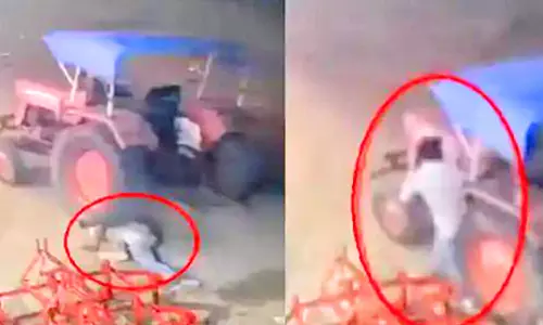 திருடிய டிராக்டர் சக்கரத்தில் சிக்கிய திருடன்