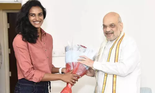 உள்துறை மந்திரி அமித்ஷாவுடன் பி.வி.சிந்து சந்திப்பு