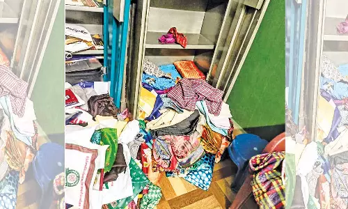 கோர்ட்டு ஊழியர் வீட்டில் நகை-பணம் கொள்ளை