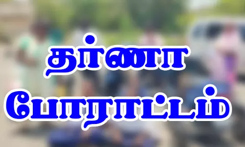 பொய் வழக்கு போட்டு தாக்கியதாக புகார்-கலெக்டர் கார் முன்பு பெண் தர்ணா