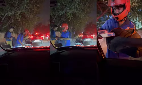 டிராஃபிக்ல இருந்தாலும் சுடச்சுட டெலிவரி செய்வோம்.. வைரலாகும் பீட்சா வீடியோ