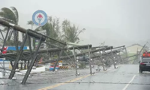 கொய்னு புயலால் ஹாங்காங்கில் ஏராளமான விமானங்கள் ரத்து