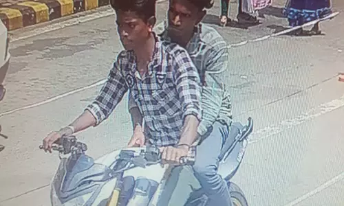 ரோட்டில் நடந்து சென்ற இளம் பெண்ணிடம் ரூ.35 ஆயிரம் வழிப்பறி