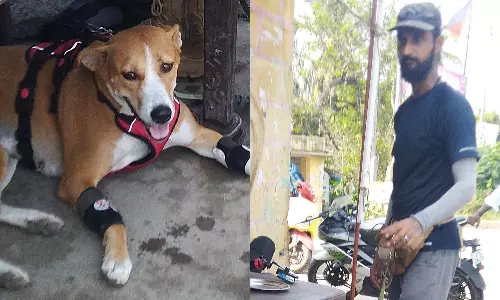 அசாம் வாலிபர் நாயுடன் ஆன்மீக யாத்திரை