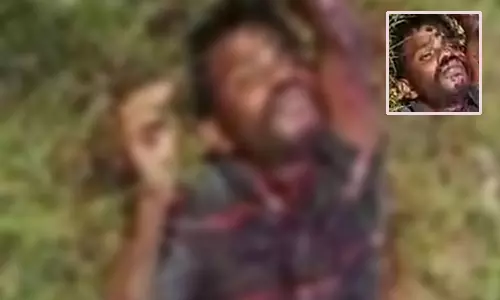 தோட்டத்தில் கழுத்து அறுபட்ட நிலையில் வாலிபர் சடலம்- கொலையா? போலீசார் விசாரணை