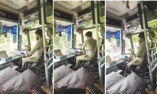 செல்போன் பேசியபடி பஸ்சை ஓட்டி சென்ற டிரைவர்