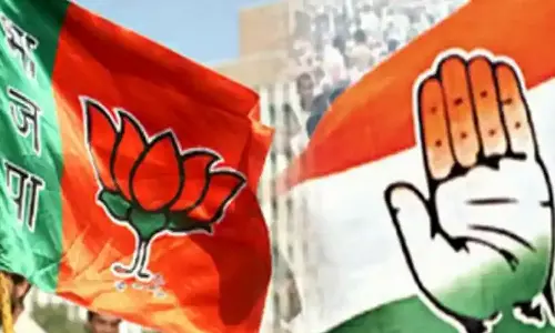 மத்திய பிரதேசத்தில் பா.ஜ.க, காங்கிரஸ் இடையே கடும் போட்டி: கருத்துக் கணிப்பு