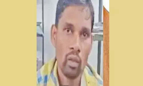 மனைவியை கொன்று தலையுடன் சென்று போலீசில் சரணடைந்த வாலிபர்