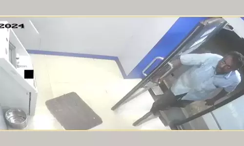 ஏ.டி.எம். எந்திரத்தில் பணம் திருட முயன்ற வாலிபர்