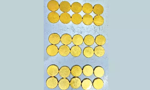 திருச்சி விமான நிலையத்தில் ரூ.76 லட்சம் மதிப்பிலான தங்க நாணயங்கள் பறிமுதல்: 3 பேர் கைது