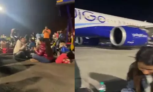 மும்பை விமான நிலையத்தில் ரன்வேயில் அமர்ந்து சாப்பிட்ட பயணிகள்