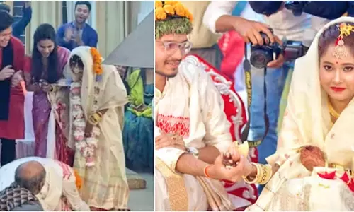 திருமணத்தின் போது மணமகளின் காலில் விழுந்த மணமகன்