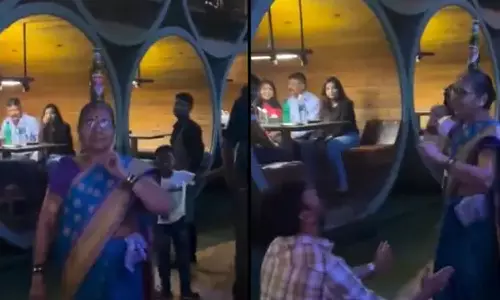 தலையில் பீர் பாட்டில் வைத்து நடனம் ஆடிய மூதாட்டி- வைரலாகும் வீடியோ