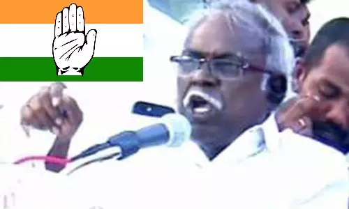 பா.ஜ.க. மேடையில் கை சின்னத்துக்கு ஓட்டு கேட்ட நிர்வாகியால் பரபரப்பு